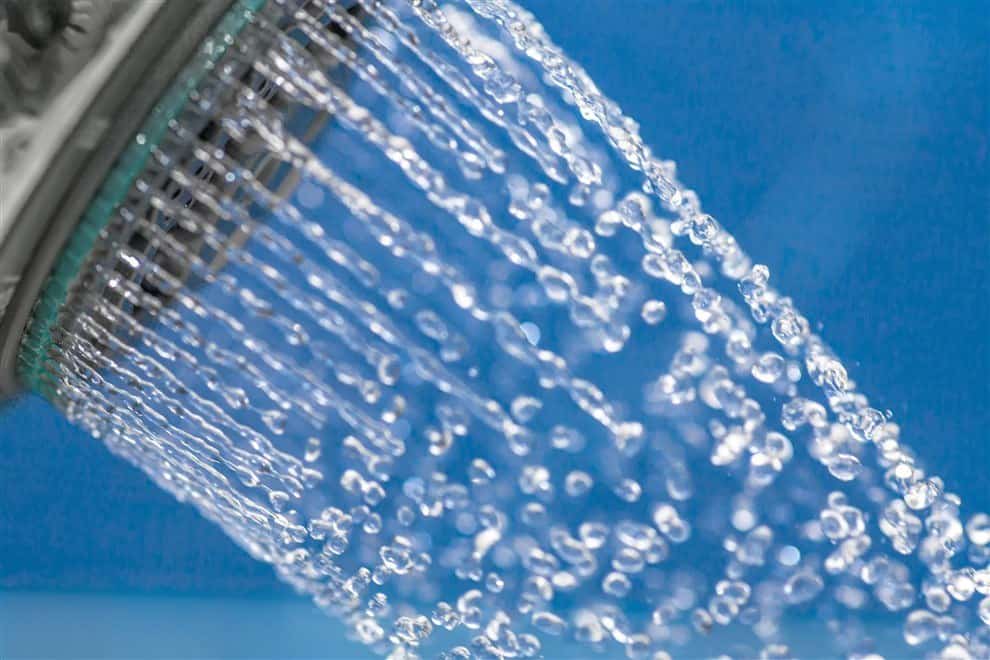 Use shower head filter to save your hair from hard water